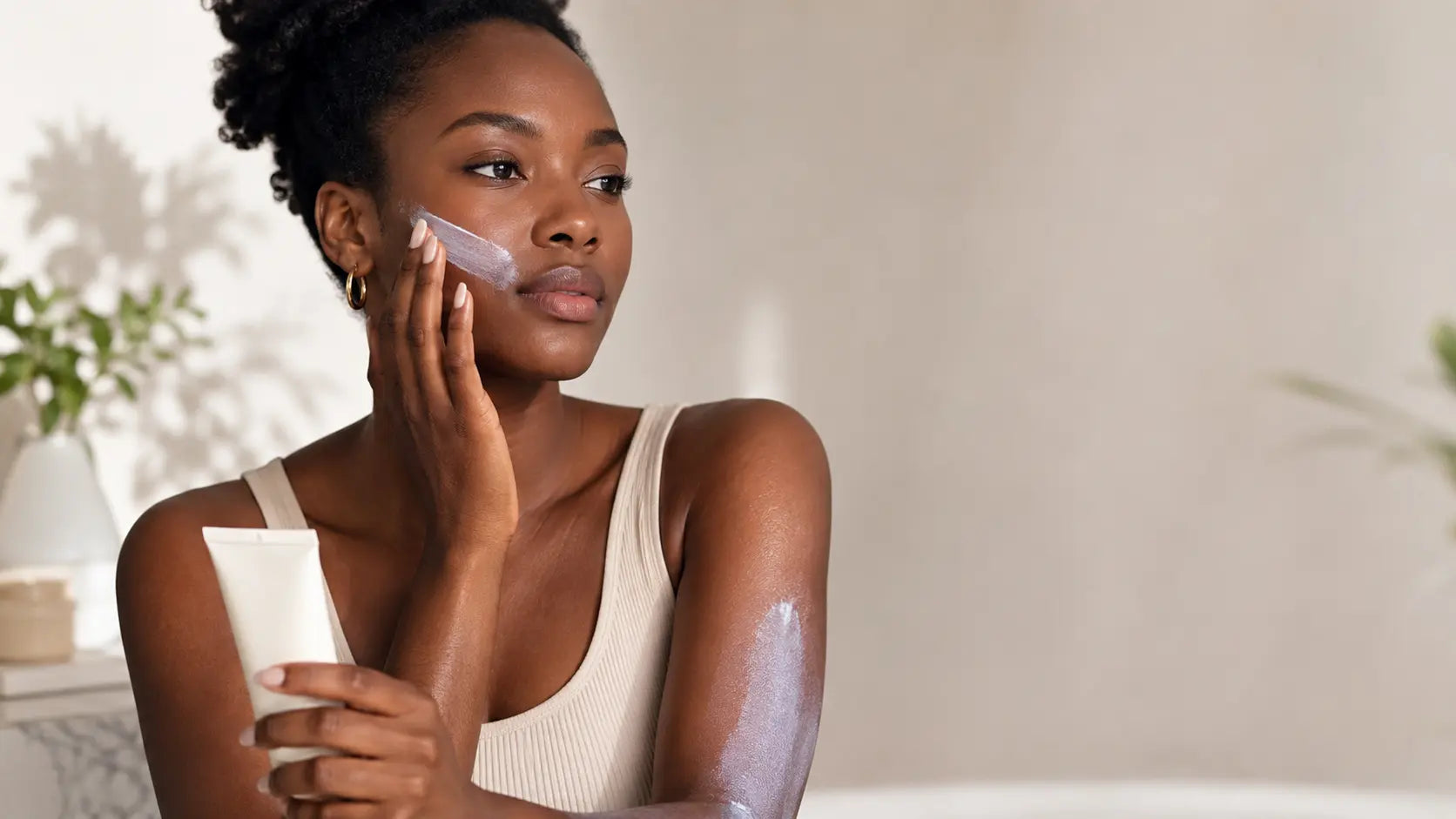 Why sunscreen lotions leave a white cast on melanated skin